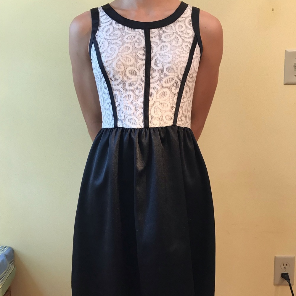 White lace with black detail dress